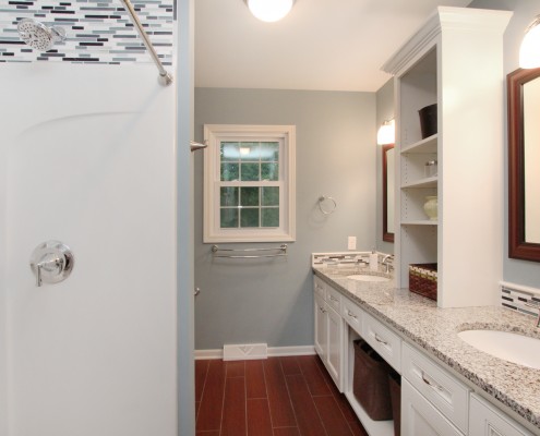 Bathroom reno with white cabinetry