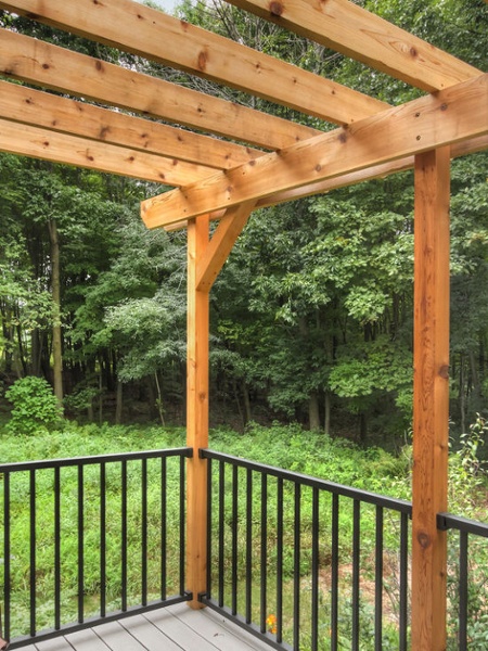 Thompson-remodeling-Log Cabin Deck with Pergola15.jpg