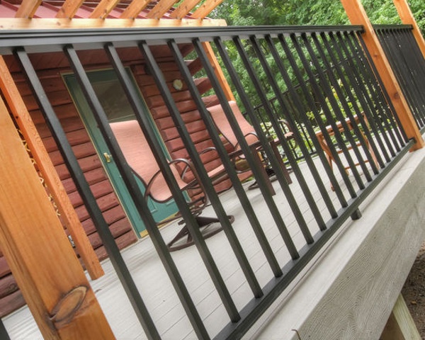 Thompson-remodeling-Log Cabin Deck with Pergola17.jpg