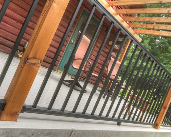 Thompson-remodeling-Log Cabin Deck with Pergola18.jpg