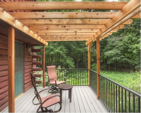 Thompson-remodeling-Log Cabin Deck with Pergola7.jpg