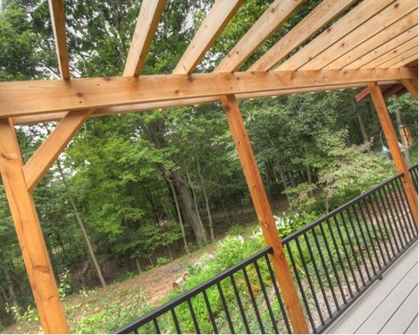 Thompson-remodeling-Log Cabin Deck with Pergola8.jpg